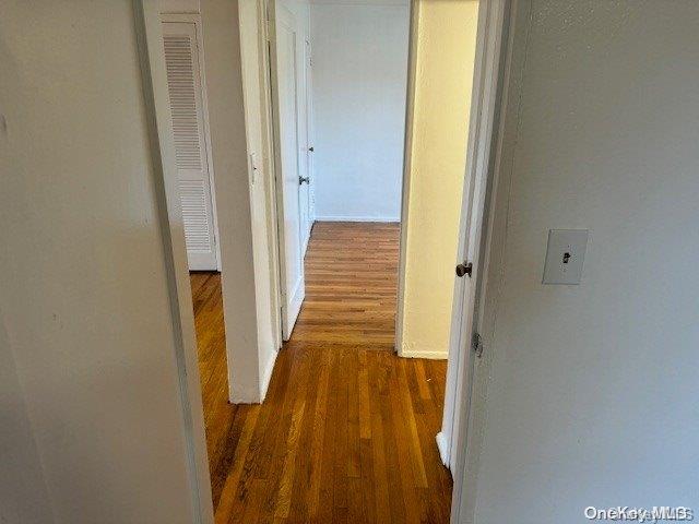 hall featuring dark hardwood / wood-style flooring