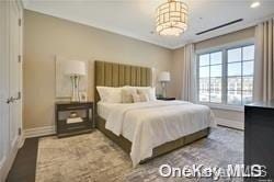 bedroom with a chandelier