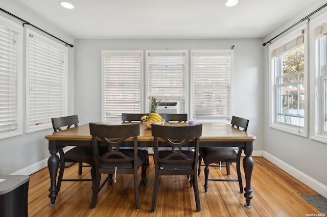 dining area with light hardwood / wood-style flooring