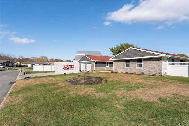 view of front of property with a front lawn