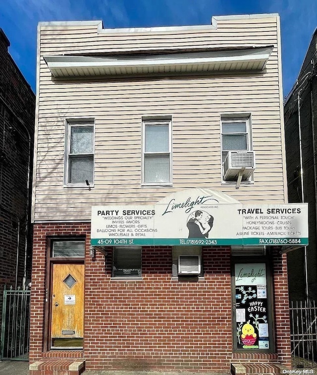 view of building exterior featuring cooling unit