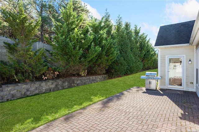 view of patio with a grill