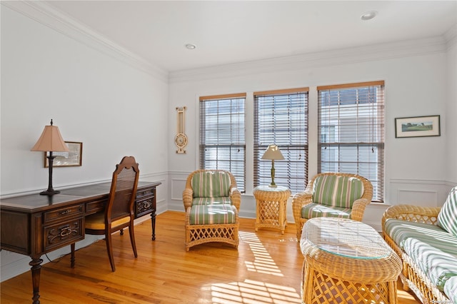 interior space with ornamental molding and light wood-type flooring