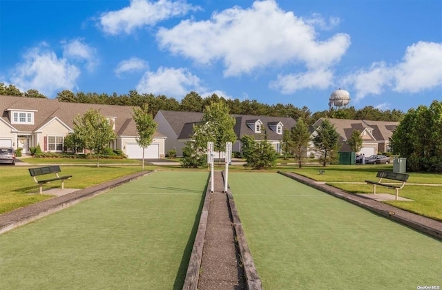 view of home's community featuring a lawn