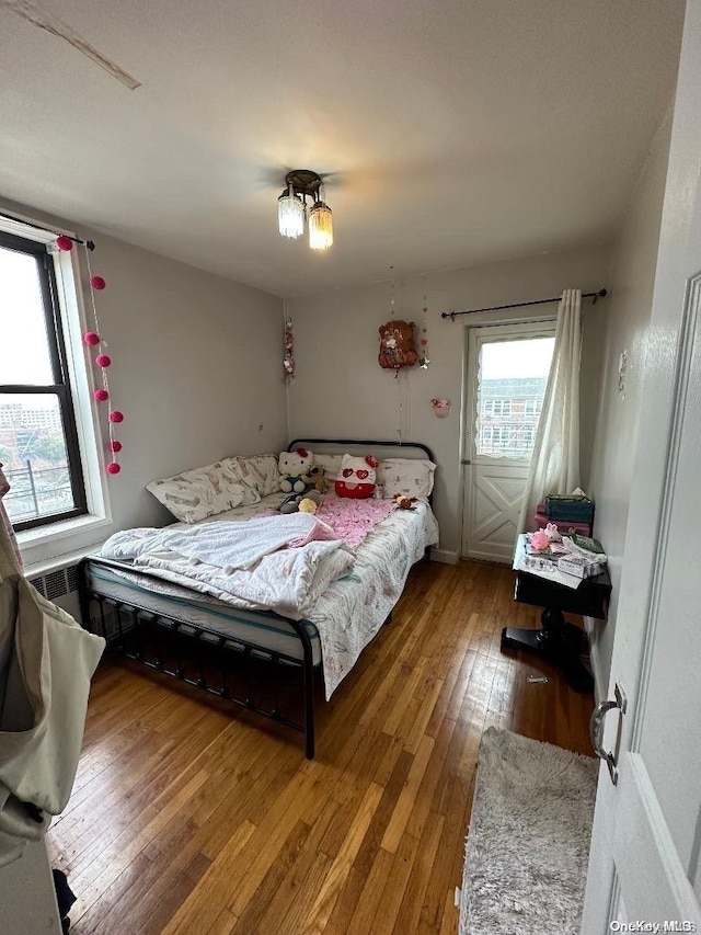 bedroom featuring hardwood / wood-style flooring