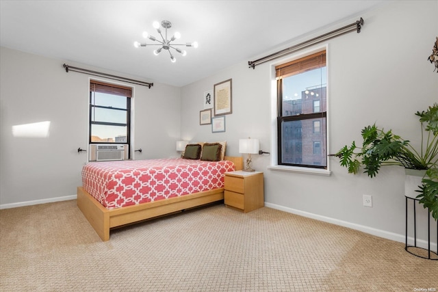 bedroom with a chandelier, carpet floors, multiple windows, and cooling unit