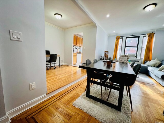 80-09 35th Ave Unit C16, Jackson Heights, NY 11372 - dining room featuring ornamental molding, a desk, and baseboards