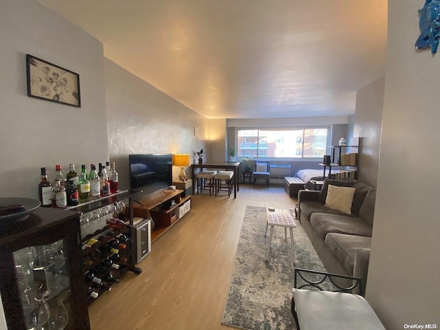 living room with light hardwood / wood-style flooring