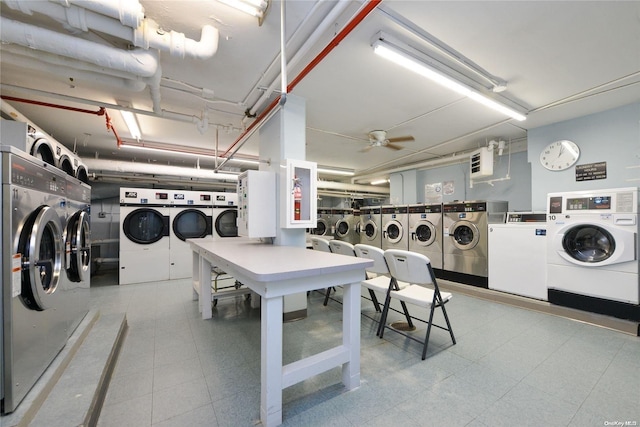 clothes washing area with washing machine and dryer, ceiling fan, and stacked washing maching and dryer