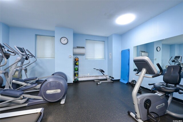 workout area with a wall unit AC