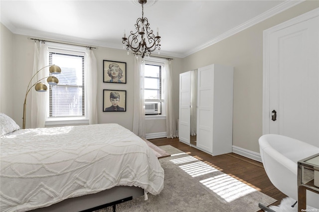 bedroom with a chandelier, crown molding, and dark wood-type flooring