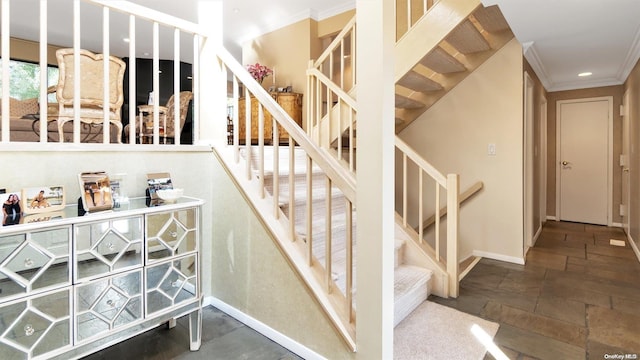 stairway with crown molding