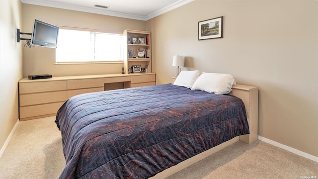 bedroom featuring ornamental molding and light carpet