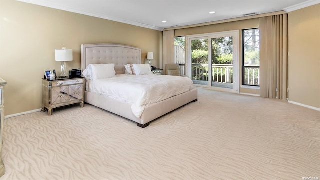 bedroom with access to exterior, light colored carpet, and ornamental molding