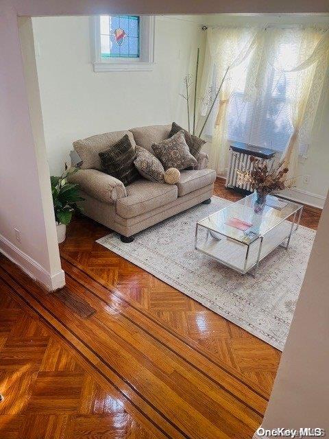 living room with parquet floors