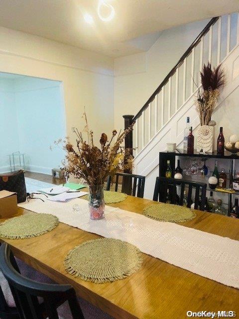 dining space featuring hardwood / wood-style flooring