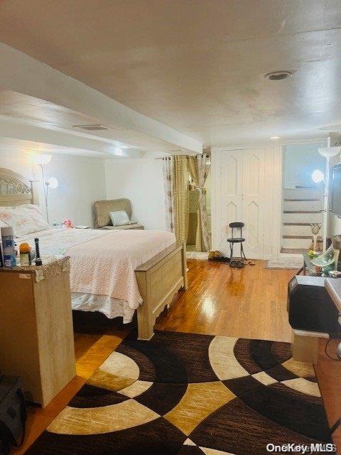 bedroom featuring light hardwood / wood-style floors