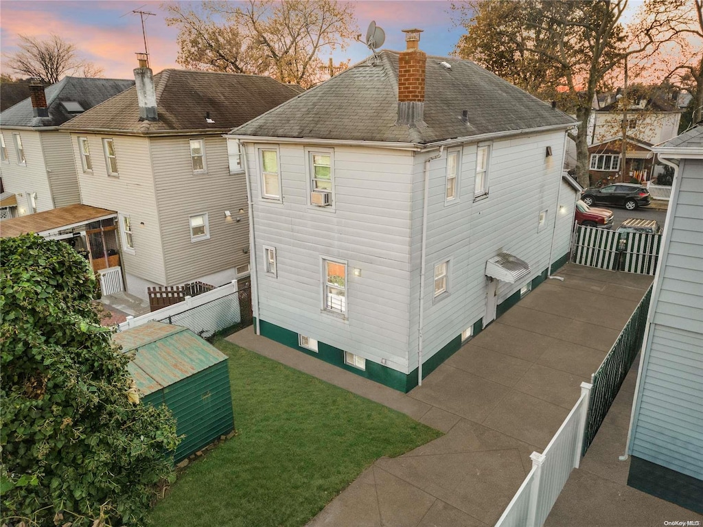 view of property exterior at dusk