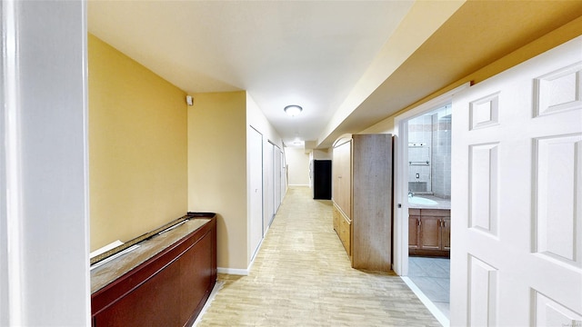 hall featuring light hardwood / wood-style flooring