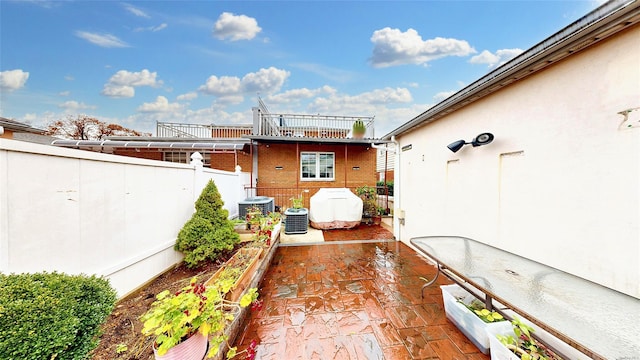 view of patio / terrace with central air condition unit