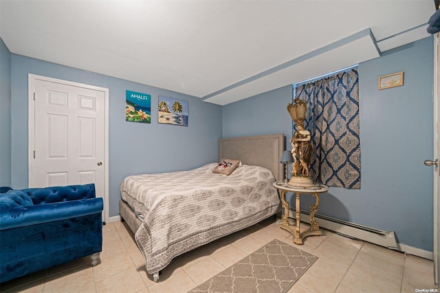 tiled bedroom featuring baseboard heating