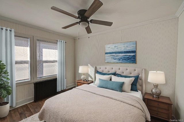 bedroom featuring crown molding, dark hardwood / wood-style floors, radiator heating unit, and ceiling fan