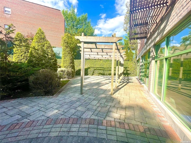 view of patio featuring a pergola