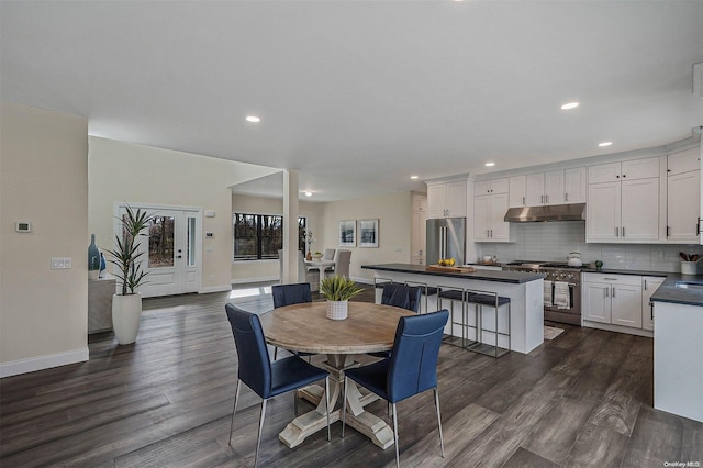 dining room featuring dark hardwood / wood-style flooring