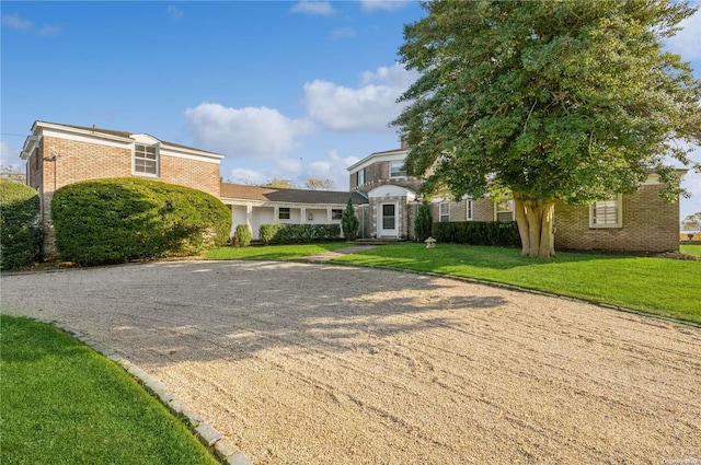 view of front of home featuring a front lawn