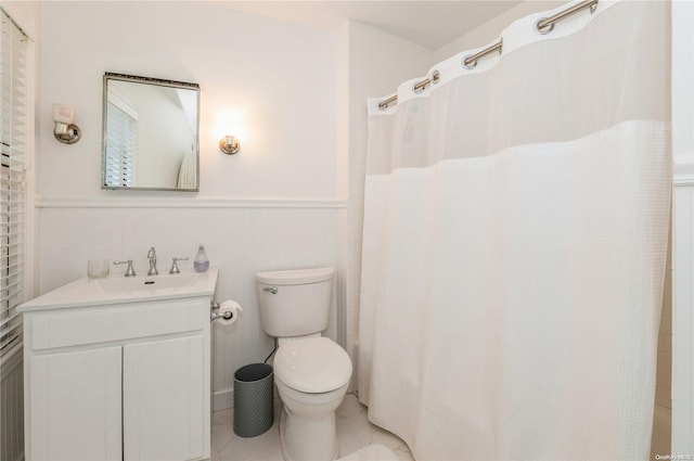 bathroom with vanity, toilet, and walk in shower