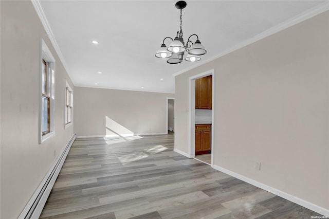 unfurnished dining area featuring an inviting chandelier, crown molding, light hardwood / wood-style flooring, and a baseboard radiator