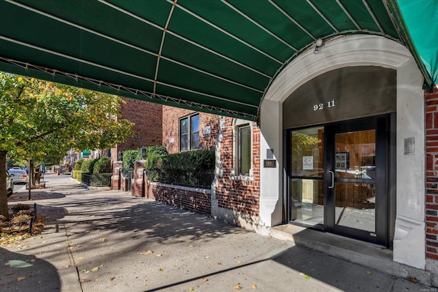 property entrance featuring french doors