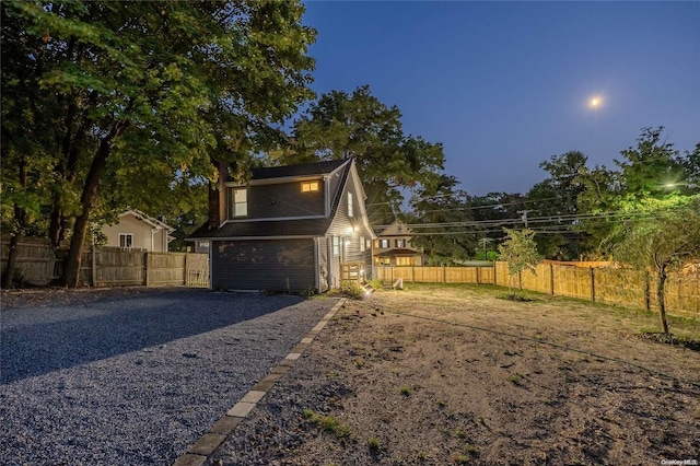 view of property exterior at dusk