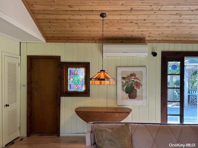 dining area featuring a wall mounted air conditioner, wood walls, lofted ceiling, and wood ceiling