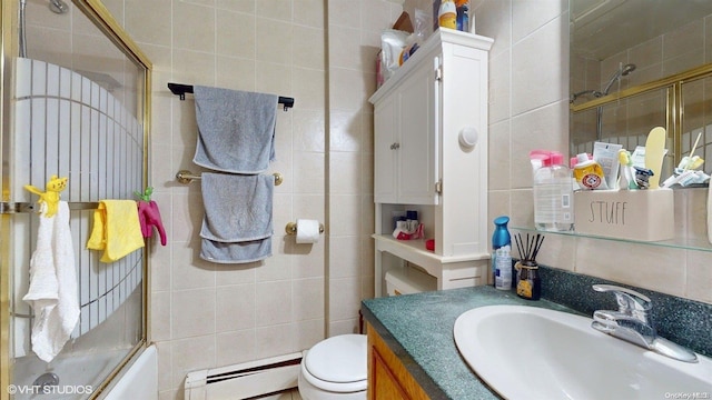 full bathroom featuring a baseboard radiator, tile walls, and bath / shower combo with glass door