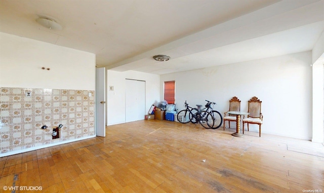 miscellaneous room with wood-type flooring