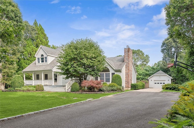 cape cod-style house with an outdoor structure, a front yard, a porch, and a garage