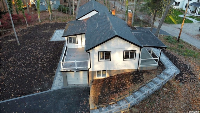 exterior space with a garage