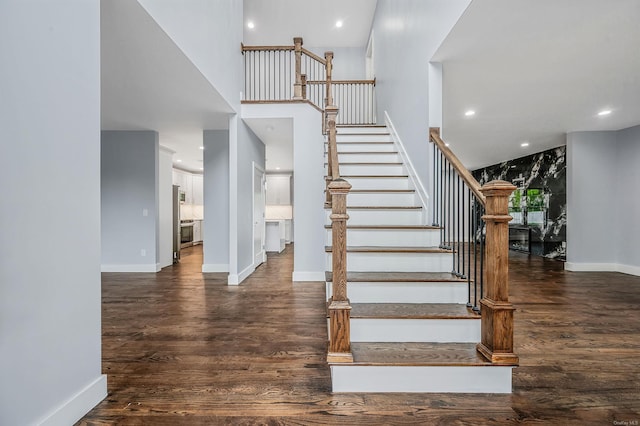 146 Walter Ave, Hauppauge, NY 11788 - staircase with recessed lighting, baseboards, and wood finished floors
