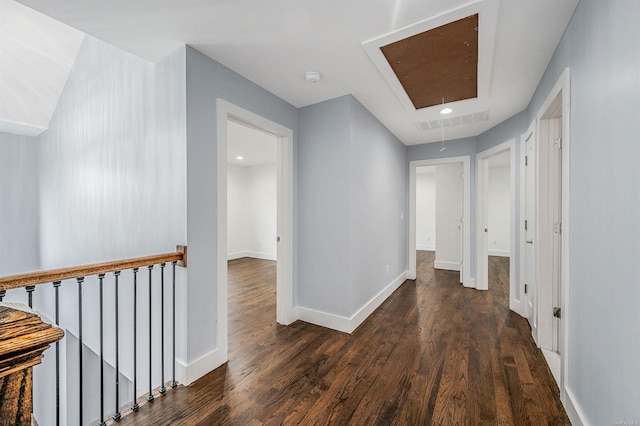 146 Walter Ave, Hauppauge, NY 11788 - hall with baseboards, an upstairs landing, attic access, and wood finished floors