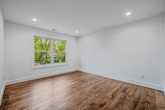 146 Walter Ave, Hauppauge, NY 11788 - spare room with recessed lighting, baseboards, visible vents, and wood finished floors