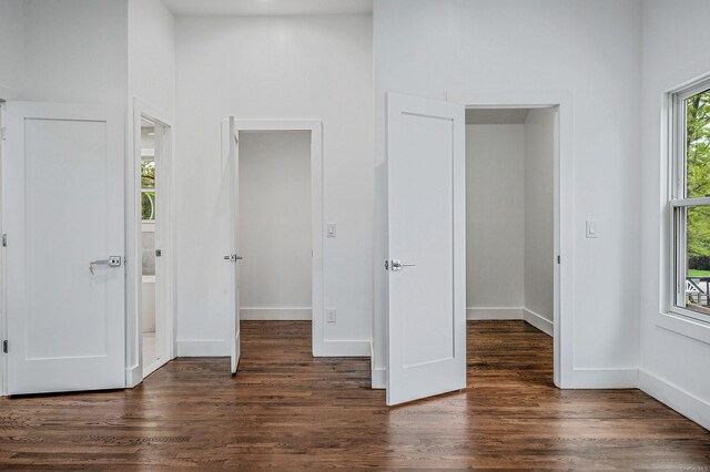 146 Walter Ave, Hauppauge, NY 11788 - unfurnished bedroom with wood finished floors and baseboards