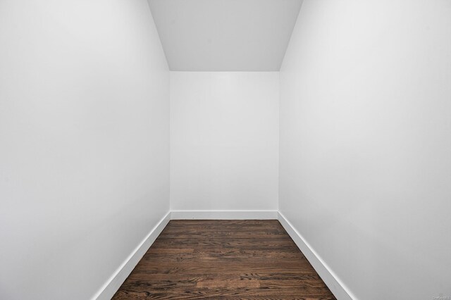 146 Walter Ave, Hauppauge, NY 11788 - interior space featuring lofted ceiling and dark wood-style floors