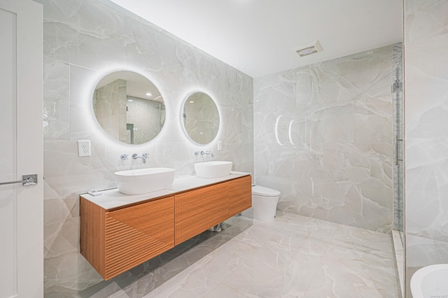 146 Walter Ave, Hauppauge, NY 11788 - bathroom featuring a sink, tile walls, toilet, and marble finish floor