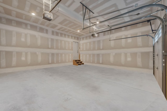 146 Walter Ave, Hauppauge, NY 11788 - garage featuring a garage door opener
