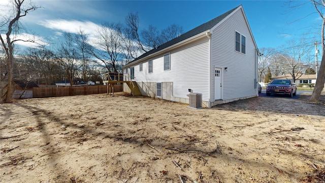 view of property exterior with cooling unit