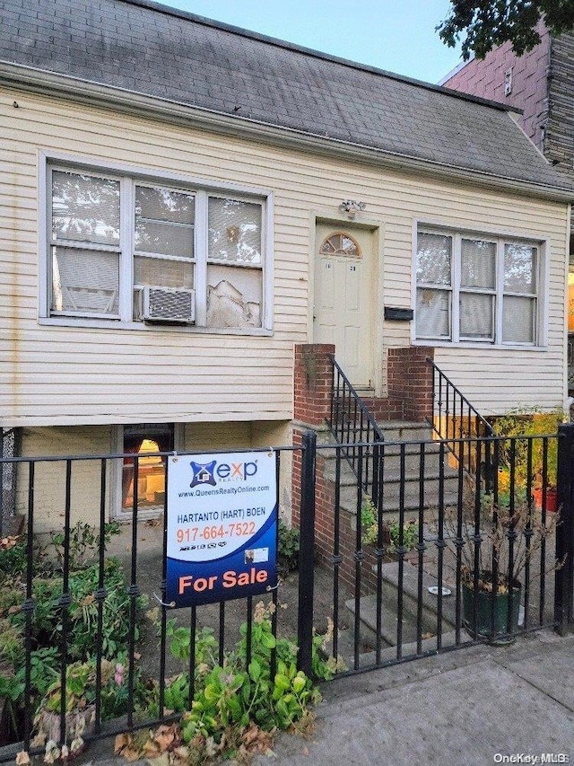 view of front of home with cooling unit