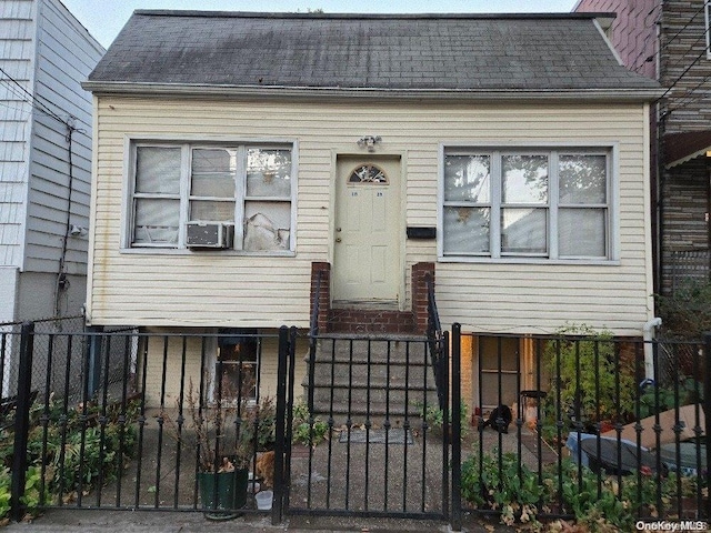 view of front facade with cooling unit