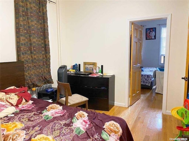 bedroom featuring light hardwood / wood-style flooring