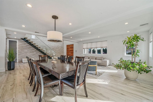 dining room with light hardwood / wood-style flooring